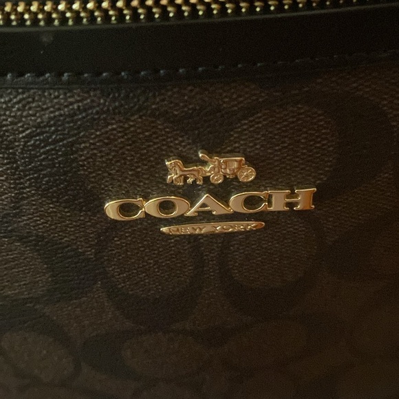 This is a brown and black coach satchel - Picture 3 of 7